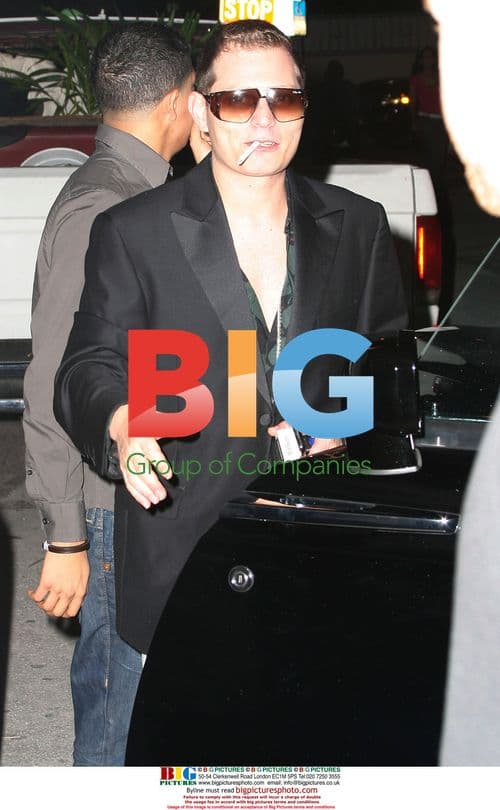 Paris Hilton and Scott Storch leave club in Miami