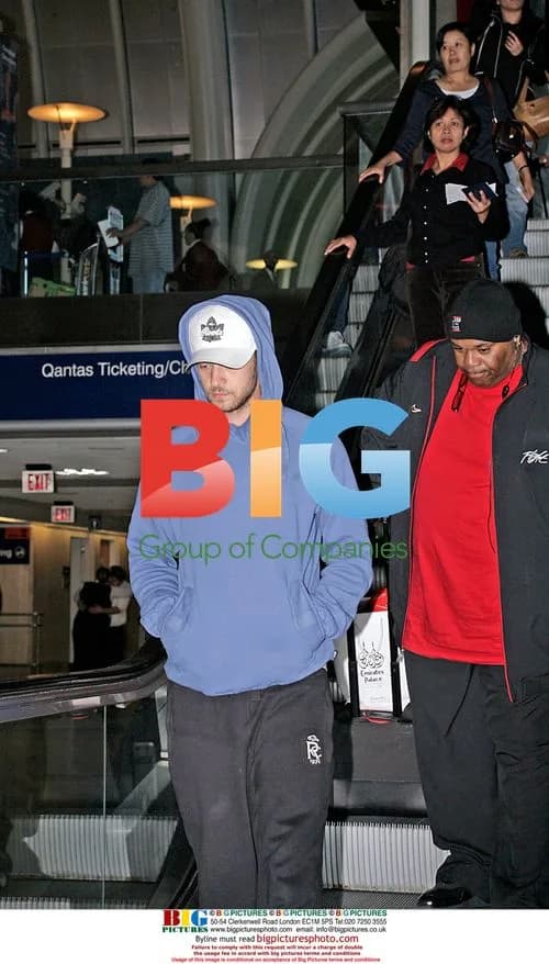 Justin Timberlake Arrives at LAX with Bodyguard