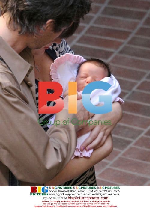 Milla Jovovich and Paul W.S. Anderson with daughter Ever