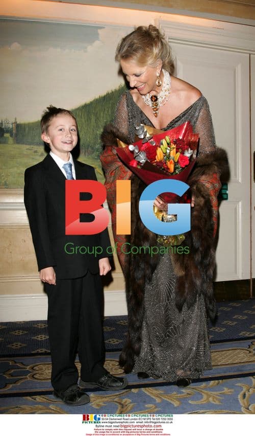 9-Year-Old Presents Princess with Flowers