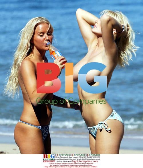 Models Anna Taverner and Michelle Marsh relax in France