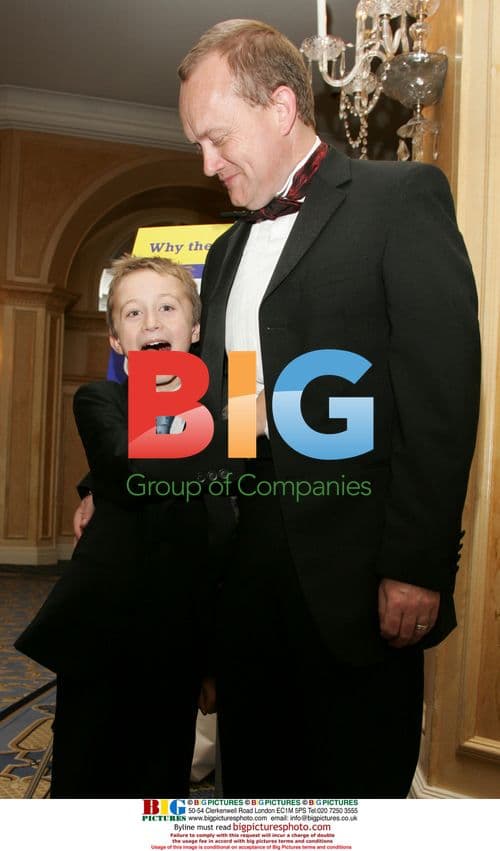 Steven Tomlinson presents flowers to Princess Michael