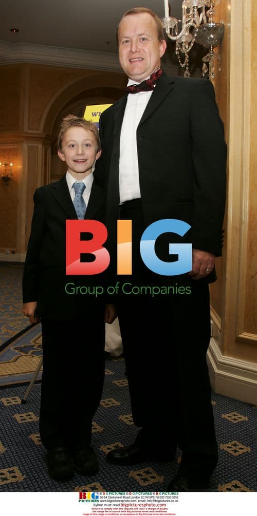 Steven Tomlinson presents flowers to Princess Michael