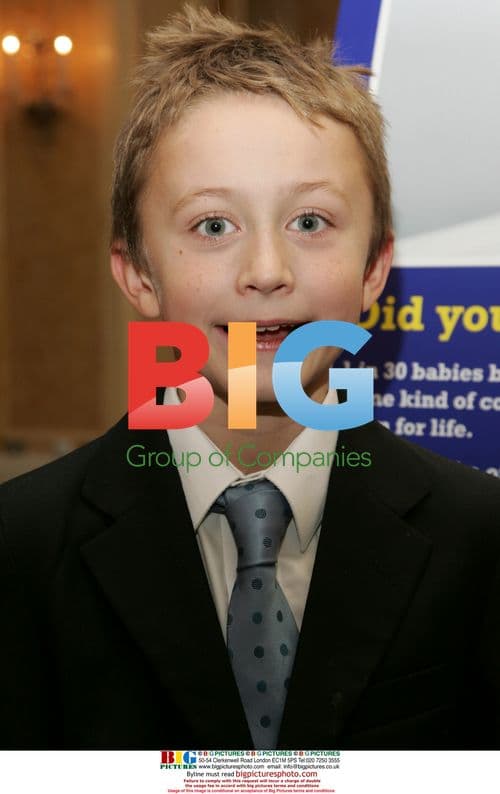 Steven Tomlinson presents flowers to Princess Michael