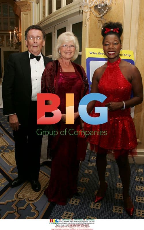 Steven Tomlinson presents flowers to Princess Michael