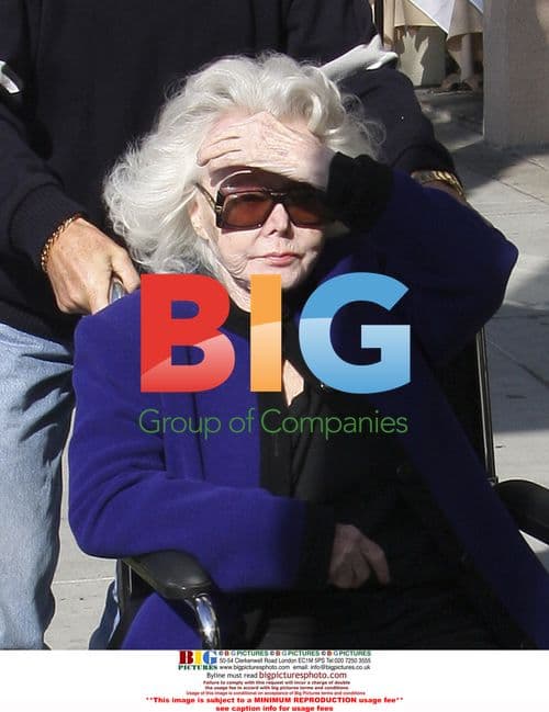 Zsa Zsa Gabor Leaves Salon With Husband