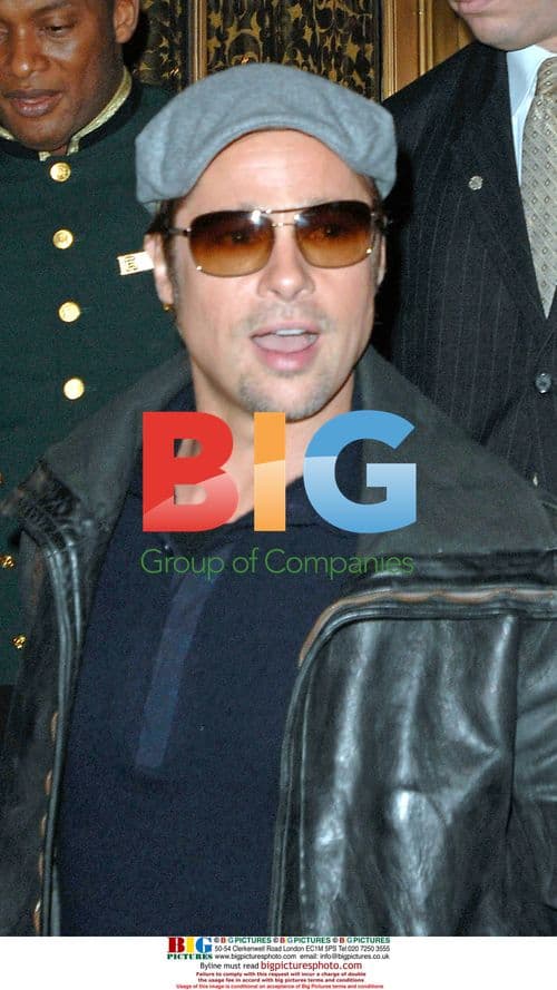 Brad Pitt Leaves Hotel for Charlie Rose