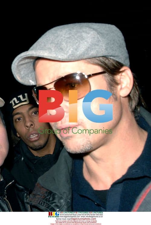 Brad Pitt Exits Midtown Hotel