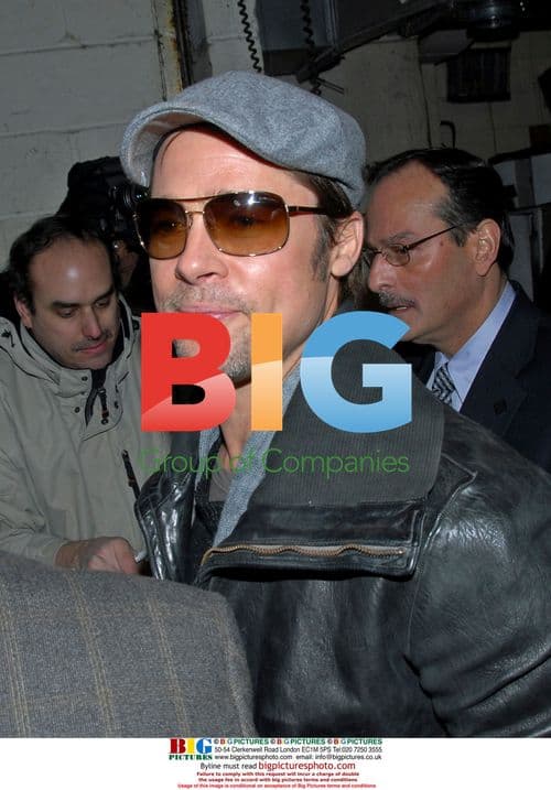 Brad Pitt Mobbed by Paparazzi in NYC