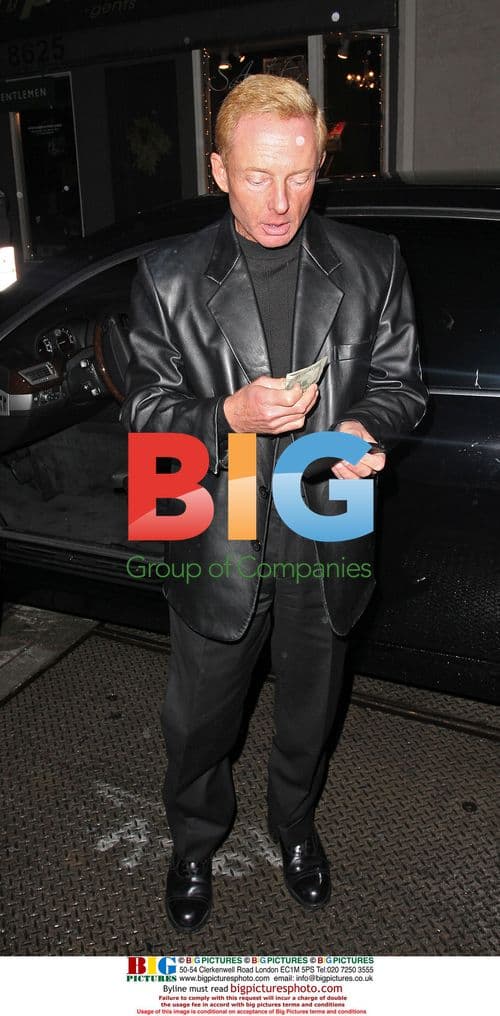 Paris Hilton's Publicist Drops $100 Bill