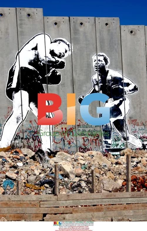 Banksy Paints on West Bank Barrier