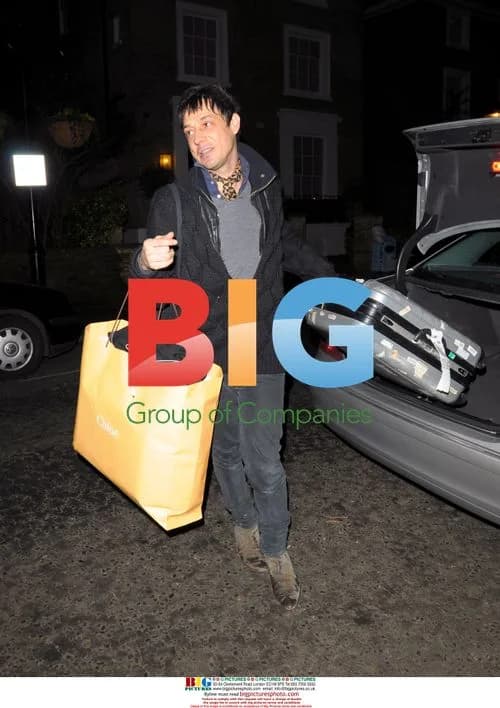 Jamie Hince arrives at Davina Taylor's