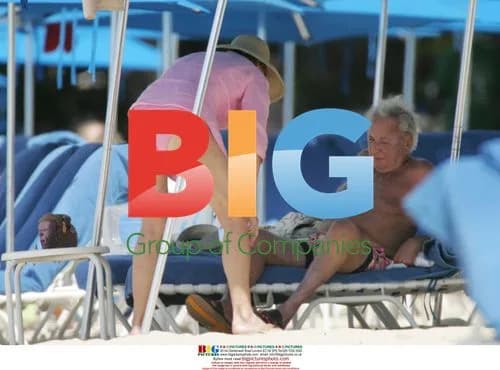 Michael Winner and Partner on Beach