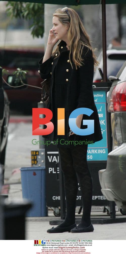 Jacinda Barrett getting coffee