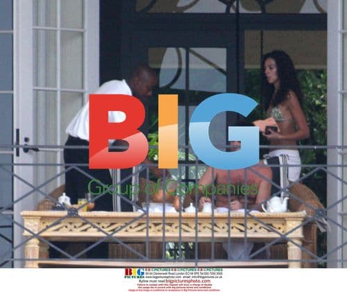 Simon Cowell Enjoys Barbados Balcony