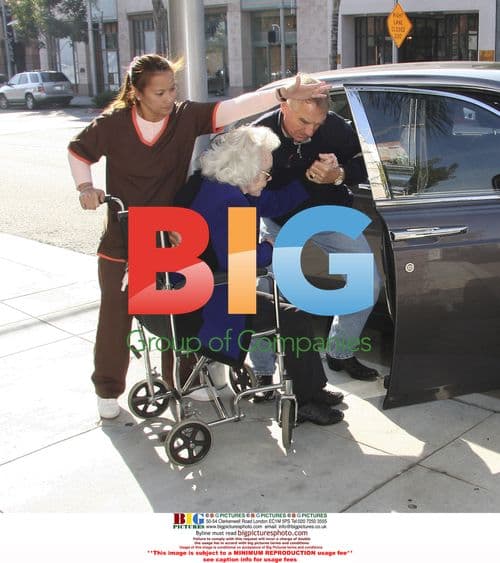 Zsa Zsa Gabor Leaves Salon with Husband