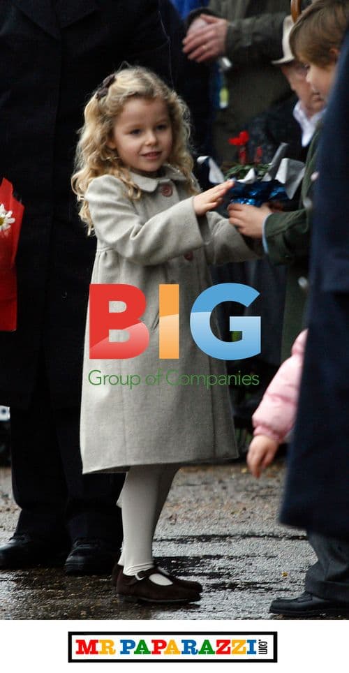 Queen Braves Rain for Christmas Service