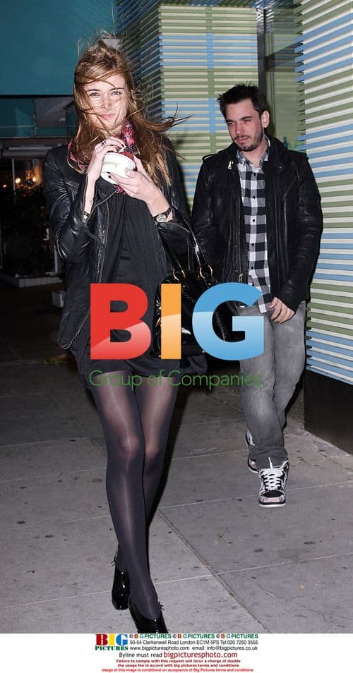 DJ AM leaves Pinkberry with mystery lady