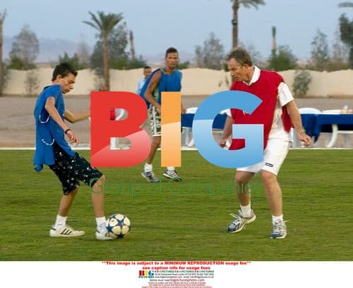 Tony Blair and son play football in Sharm El Sheikh