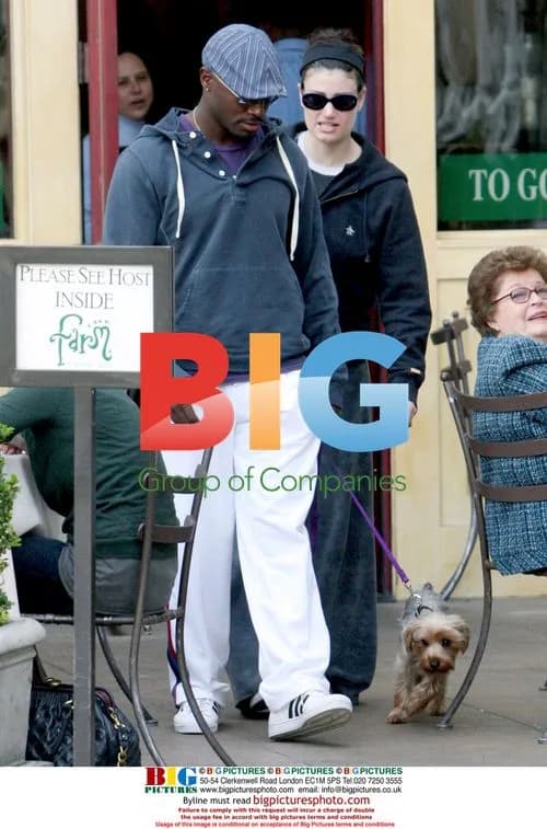 Taye Diggs and Idina Menzel with dog at LA restaurant