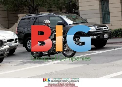 Brad Pitt on Motorcycle Near Offices