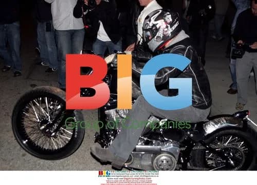Brad Pitt rides motorcycle in Hollywood