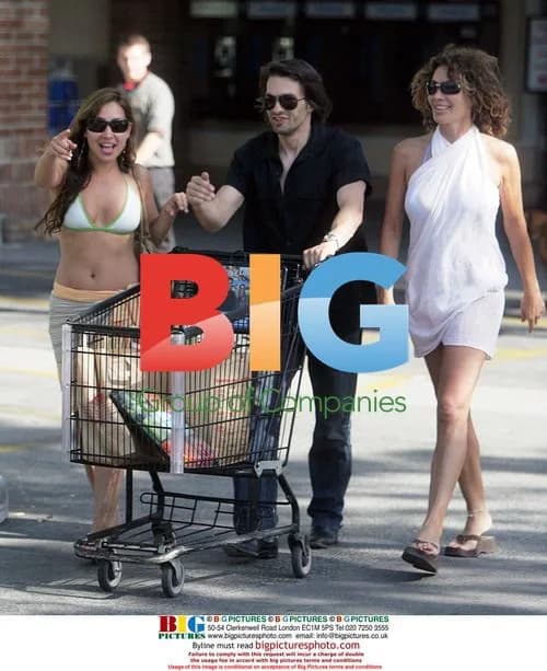 Olivier Martinez with two women in Malibu