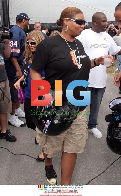 Queen Latifah and Fergie at Super Bowl Grand Prix