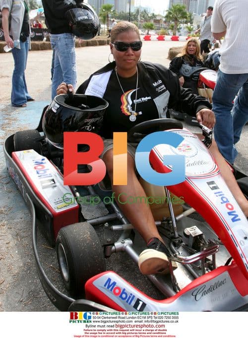 Queen Latifah and Fergie at Super Bowl Celebrity Grand Prix