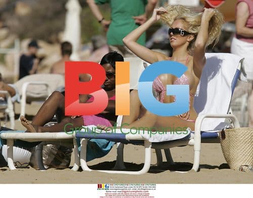 Aisleyne Horgan-Wallace Flaunts Figure in Caribbean