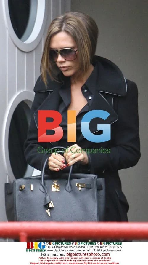 Victoria Beckham Leaving Office with Birkin Bag