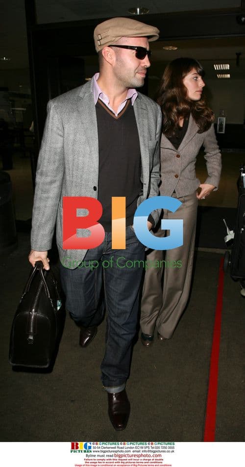 Kelly Brook and Billy Zane Arrive at LAX