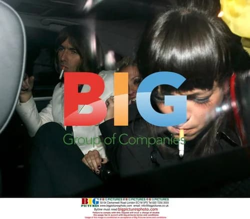 Lily Allen attempts to hit photographer
