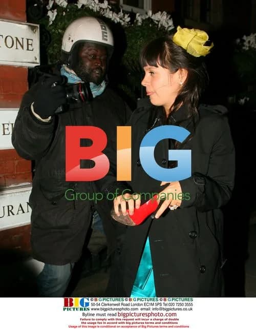 Lily Allen attempts to hit photographer