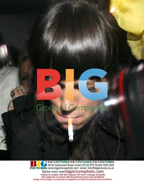 Lily Allen attempts to hit photographer