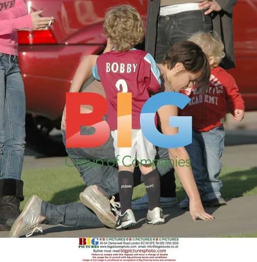 Jade Goody Lacing Up Bobby's Boots