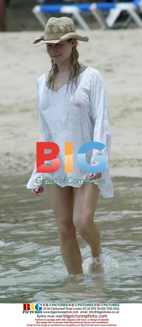 Abi Titmuss sunbathing in Caribbean