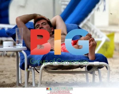 X-Factor Judge Relaxes on Caribbean Vacation