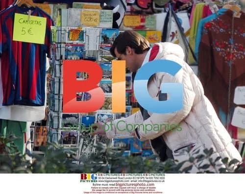 Hugh Jackman Buys Souvenirs in Madrid
