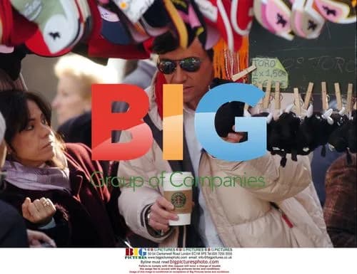 Hugh Jackman Buys Souvenirs in Madrid