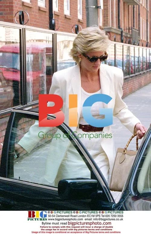 Diana, Princess of Wales returns to car after lunch