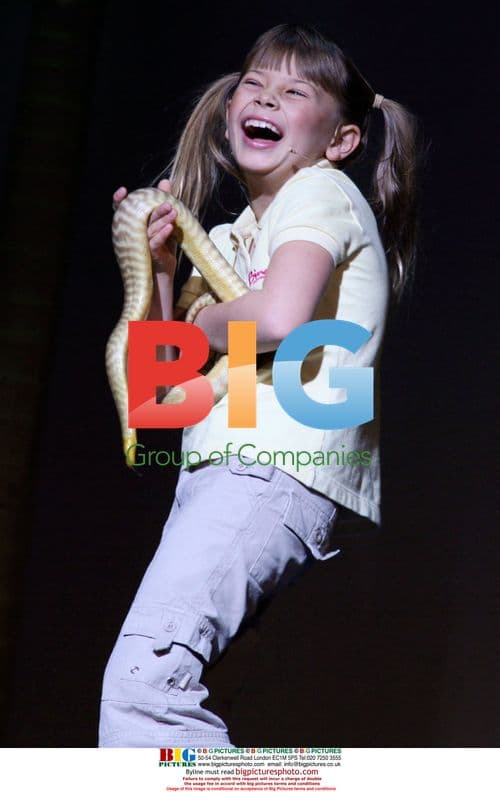Bindi Irwin shows snake at G'Day USA concert