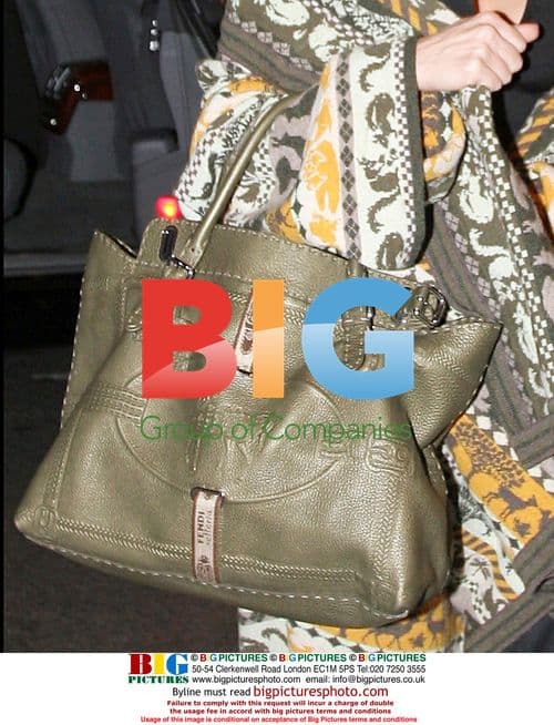 Victoria \"POSH\" Beckham Arrives in Paris