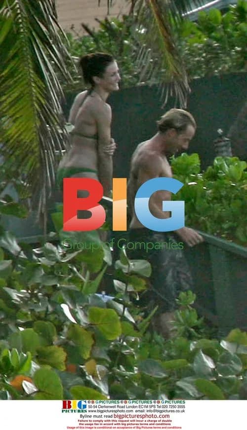 Kelly Slater and Cameron Diaz on Hawaii Beach