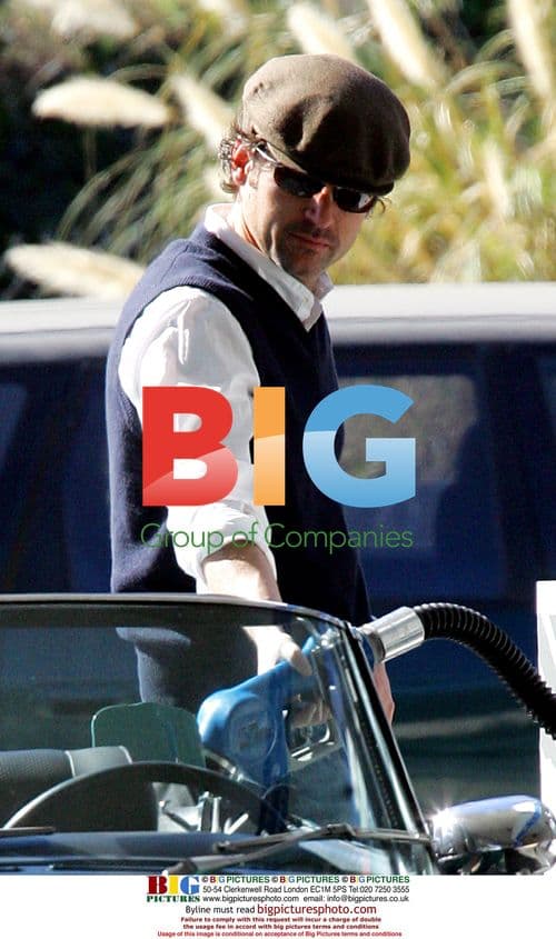 Patrick Dempsey Pumping Gas in Jaguar