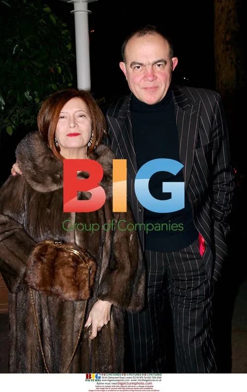 Christian Lacroix and guest at Sidaction fashion event
