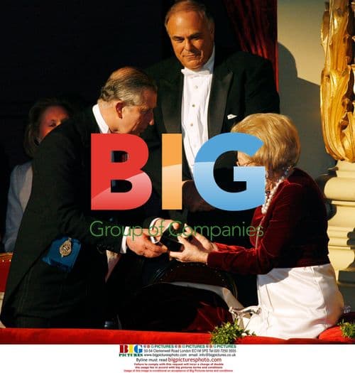 Prince Charles presents gift to Leonore Annenberg