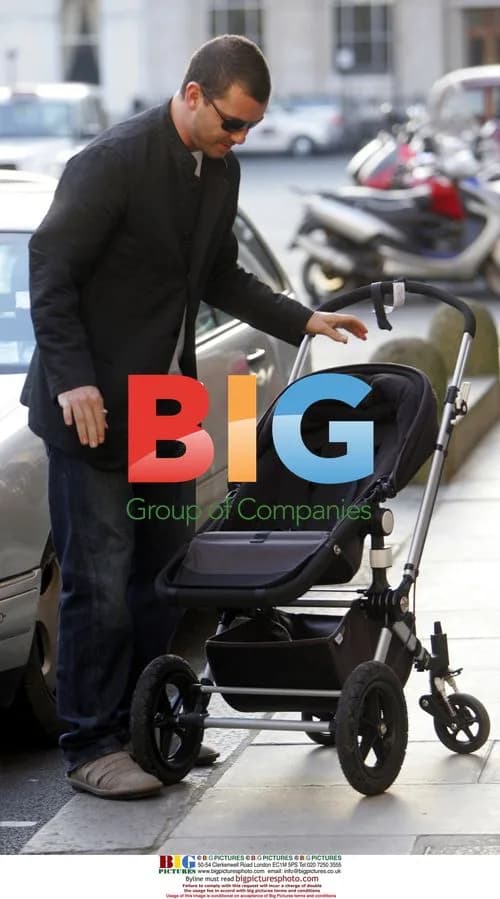 Gwen Stefani Assists Husband Gavin With Pushchair