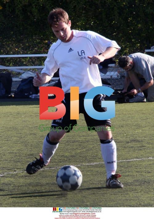 Declan Donnelly plays soccer with Robbie Williams team