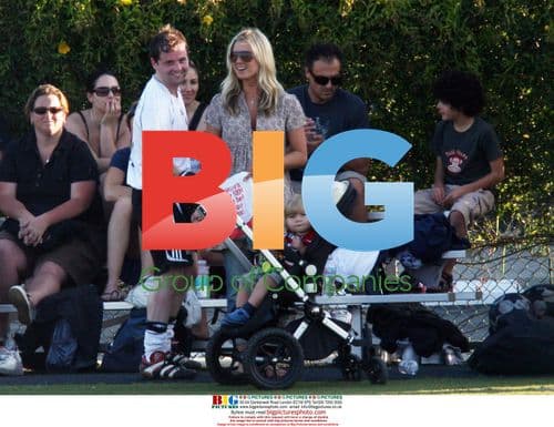 Declan Donnelly plays soccer with Robbie Williams